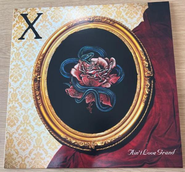 X  - Ain't Love Grand